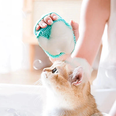 Silicone pet massager bath brush with built-in shampoo dispenser for dogs and cats, featuring soft bristles for grooming and deep cleaning.